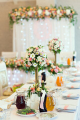 Floral decoration on a laid table wedding banquet