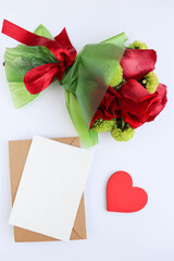 Happy Valentine's Day greeting card. beautiful bouquet of flowers and red heart