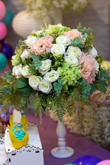 decorated with artificial flowers on a table in a restaurant