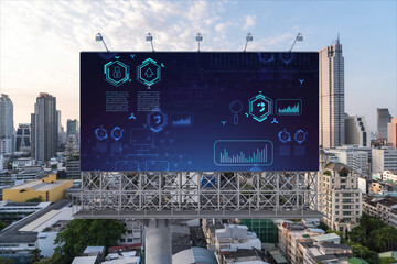 Glowing hologram of technological process on billboard, aerial panoramic cityscape of Bangkok at sunset. The largest innovative hub of tech services in Southeast Asia.