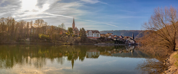Sunset scene at german river. River Neckar and city of Neckargemund in southern germany