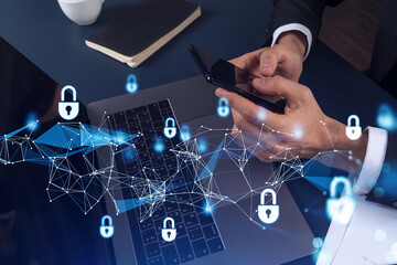 A programmer is browsing the Internet in smart phone to protect a cyber security from hacker...
