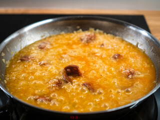 Risotto cooking in pan
