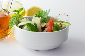 Green salad with onion, parsley, cucumber, tomato and feta cheese