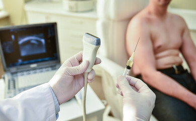Obraz na płótnie Canvas Ultrasound-guided platelet-rich plasma injection of the shoulder