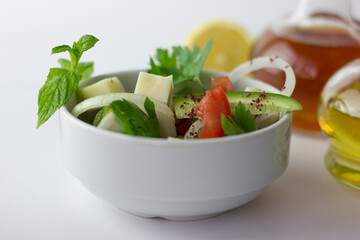 Green salad with onion, parsley, cucumber, tomato and feta cheese