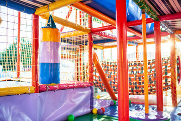 Playground with colorful mats and soft items for games