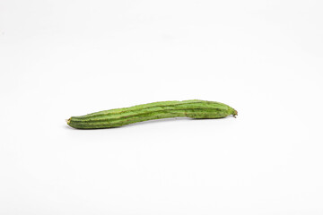 Farm fresh ridge gourds (angled luffa fruit) with isolated on white background