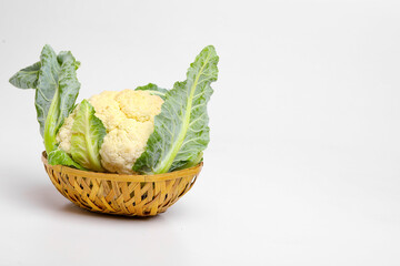 whole raw cauliflower, whole vegetable, isolated on white background