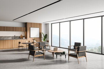 White and wooden kitchen corner- with table and poster