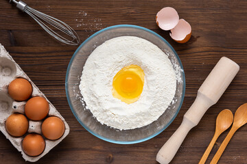 Preparation of flour products from flour and eggs. Top view.