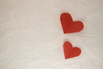 valentine's day cards on white crumpled paper. valentines on a crumpled background with a place for an inscription