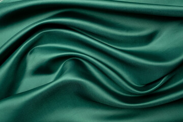 green fabric texture background, abstract, closeup texture of cloth
