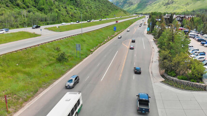Vail city center and surrounding mountains, Colorado. Aerial view from drone in summer season