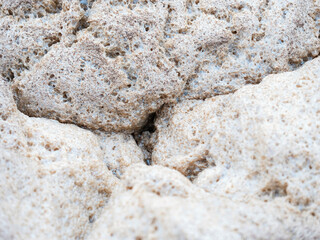 Thick brown foam on graywater level in Aeration tank. Sewage treatment plant.