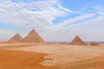 Fototapeta na wymiar The Giza pyramids from the backside, Giza in the background, Egypt