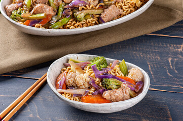 .Yakisoba, famous Japanese fried noodles, with meat and vegetables.