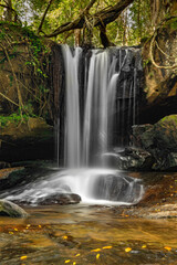 Fototapeta na wymiar Waterfall Kbal Spean in Cambodia in rainy color fresh forest
