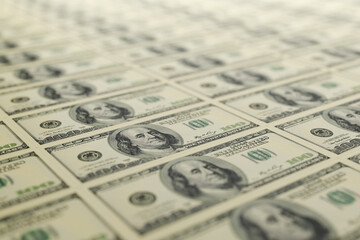 100 USA dollar bills arranged in a row. 3D rendering.