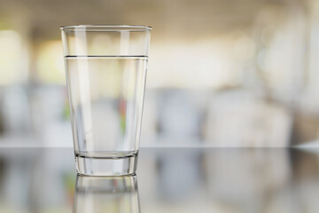 Glass of purified drink water indoors.