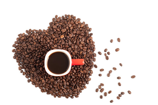 Black coffee in a red cup on the heart shape of beans isolated on white background. - Powered by Adobe