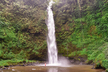 Air Terjun Nungnung waterfall. Bali, Indonesia. Travel concept
