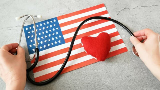 National american flag and heart. american heart month in February. Concept