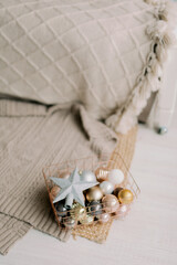 Christmas tree toys in a golden basket
