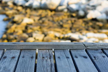 wooden board empty table in front of blurred background
