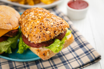 Ciabatta with vegan cutlet and greens.
