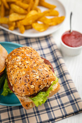 Ciabatta with vegan cutlet and greens.
