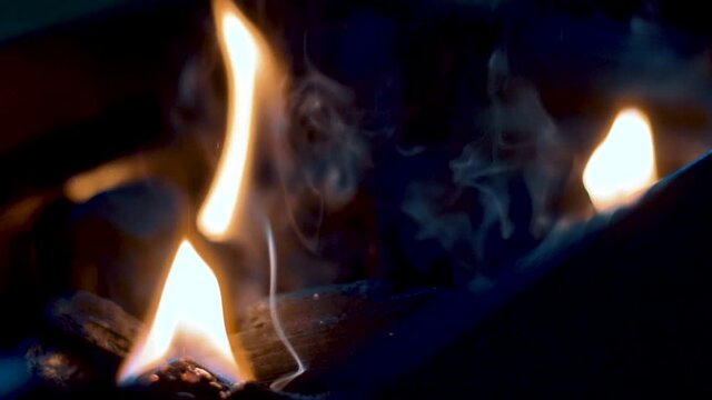 Charcoal that's light slowly burns after a barbecue in the night