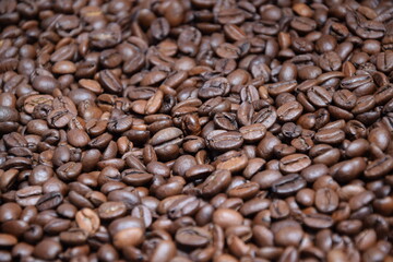 Fototapeta premium Coffee beans Roasted Arabica grain coffee background