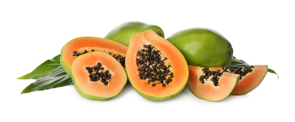 Fresh ripe papaya fruits with green leaves on white background