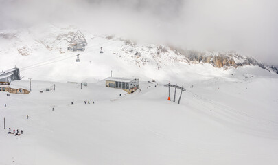 Aerial drone snow view of Cable car station at Zugspitze top of Germany