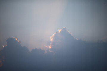 Naklejka na ściany i meble sun in the clouds