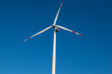 wind turbine against blue sky energie