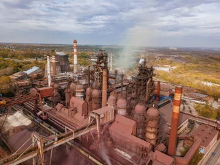 Fototapeten Verlassene Gebäude Metallurgical plant with blast furnace, drone aerial view  © Mulderphoto