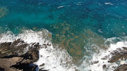 The sea hits the cliffs