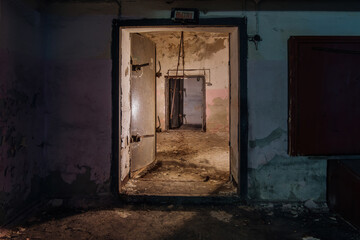 Fototapeta na wymiar Opened heavy steel armored hermetic door in the Soviet bomb shelter