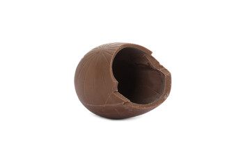 Broken milk chocolate egg on white background