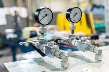 Pressure gauge in the hydraulic control system for powering equipment and machine tools.