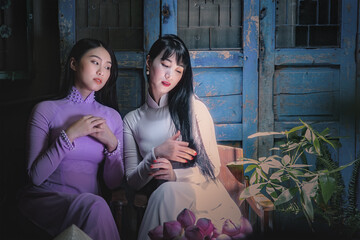 Young Vietnam woman wearing Ao Dai culture traditional at old temple at Ho Chi Minh in Vietnam,vintage style,travel and relaxing concept. - 408098646