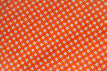 Classic orange plaid fabric or tablecloth background