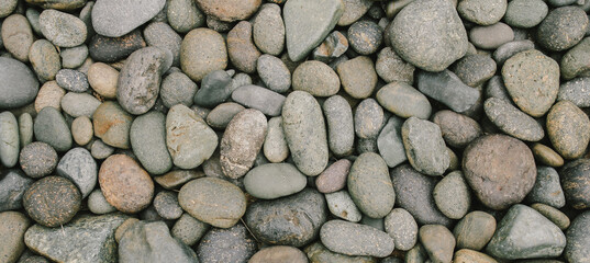 Pebbles stone background with vintage filter 