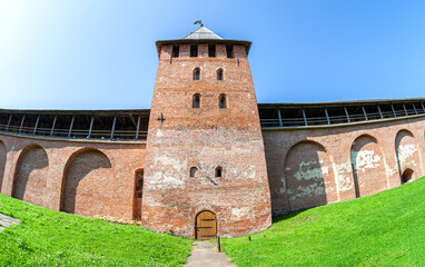 Fototapeta na wymiar Fortress wall of the Novgorod Kremlin with Knyazhaya (Prince's) watchtower