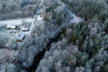Housing near the river in the winter