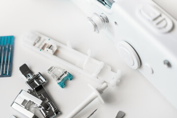 a set of tools for sewing. Basic sewing tools on a tabletop. Close up view of set of various sewing supplies on table, focus on foreground