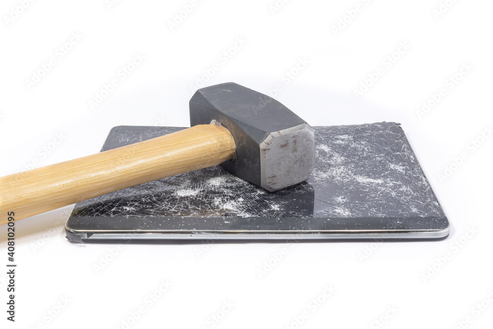 Wall mural a smashed digital tablet isolated on white has a sledgehammer laying on it with the handle at an ang