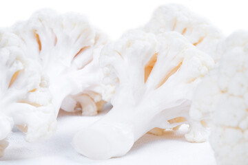 Pieces of  Cauliflower isolated on white background. Fresh Cauliflower vegetable isolated. Ripe cauliflower isolated on white background
